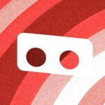 Białe gogle VR na czerwonym tle — wirtualny spacer Google
